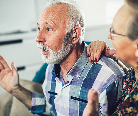 Elder Using Hearing Aid